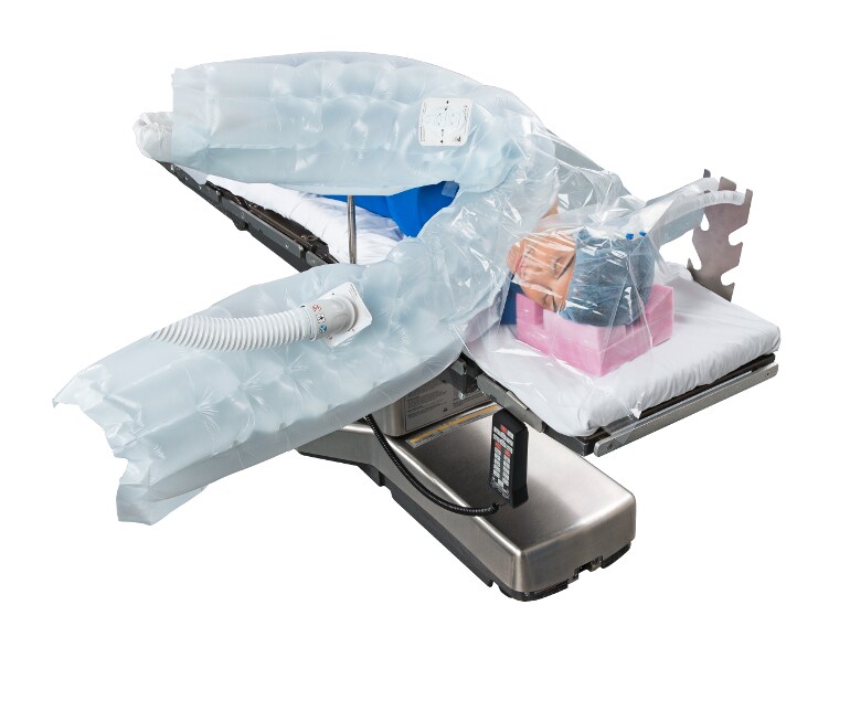 Learn how to use the Bair Hugger multi-position blanket to warm with arms out in lateral position
