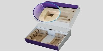 パルプモールドが両側に貼り付けられた、蓋の開いた紫と白の段ボール箱の画像。箱の上部の接合が拡大表示され強調されています。
