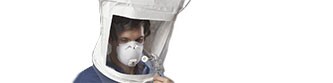 A man wearing a large respirator
