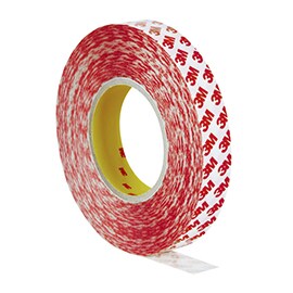 Image of a roll of 3M double coated tape with red 3M logos on a white liner