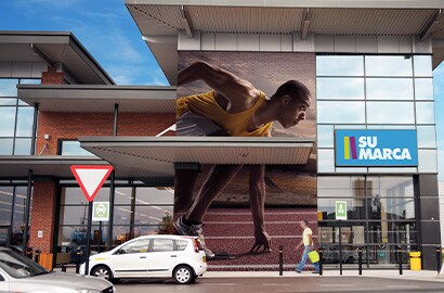 Retail exterior large wall graphic man sprinting