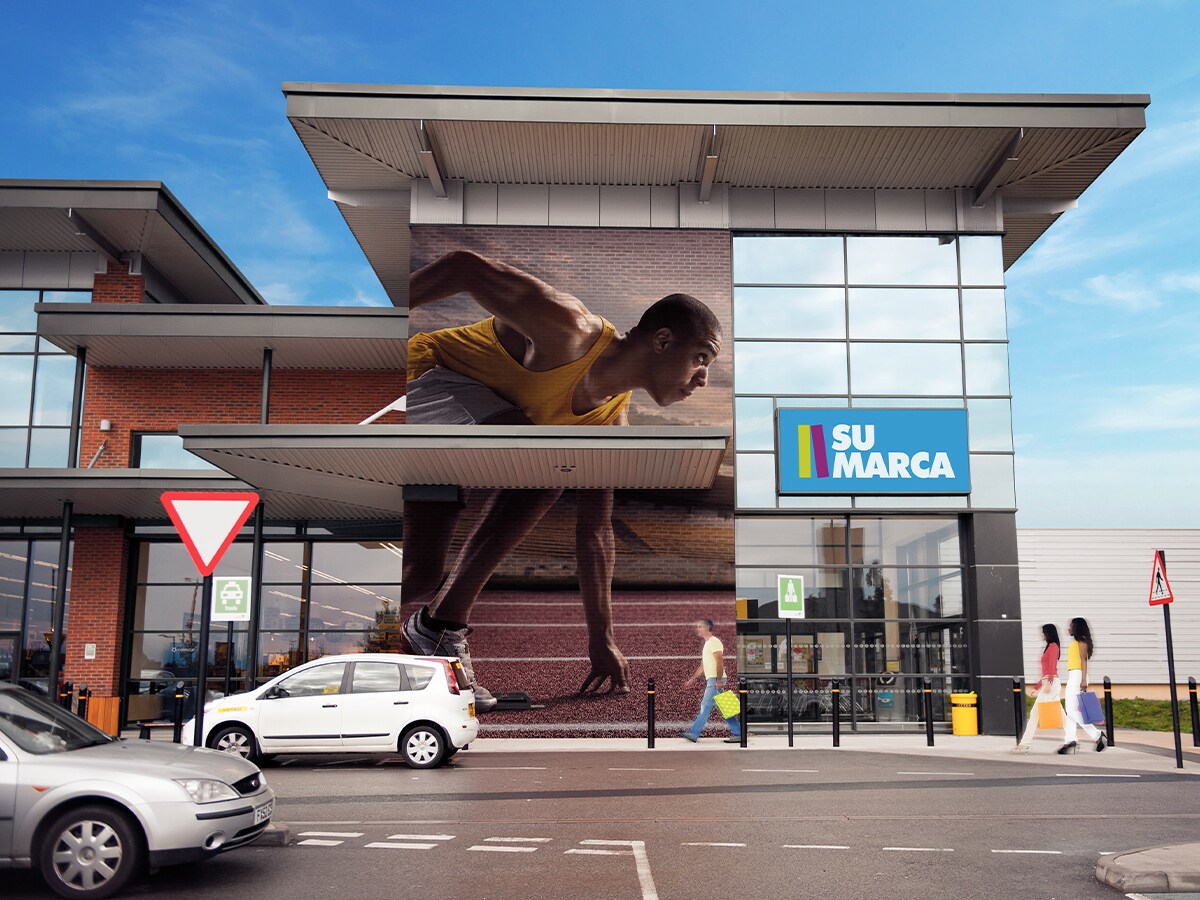 Retail exterior large wall graphic man sprinting
