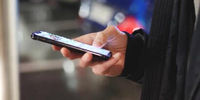 A person holding a cellphone